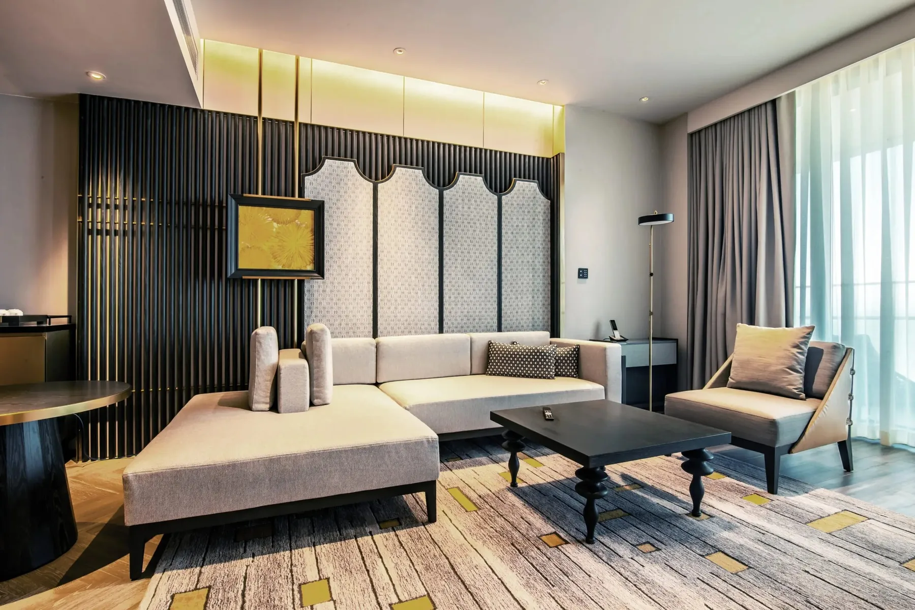 All Suites Hotel Hoi An / Da Nang connected bedroom and living furniture