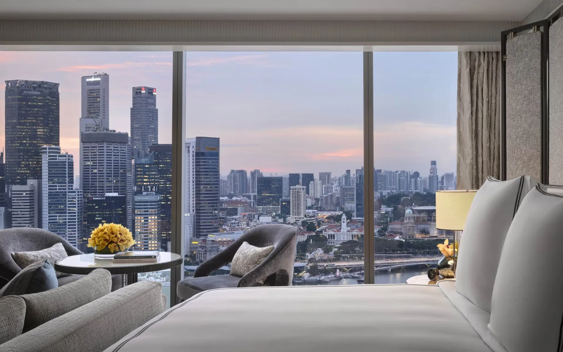 Marina Bay Sands guestroom furniture framed by the singapore skyline