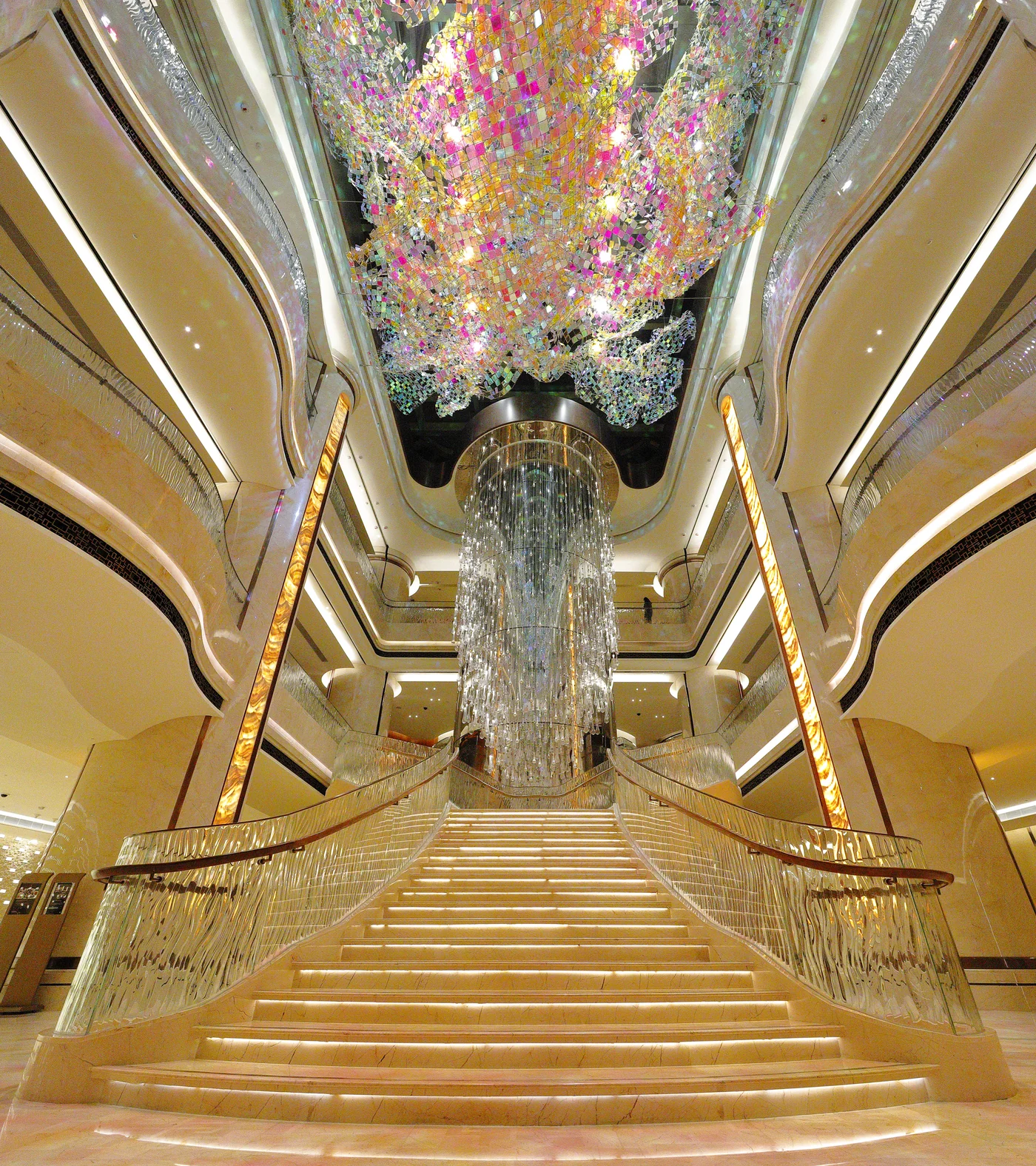 Hotel atrium stairs and escalators forming a major circulation interface