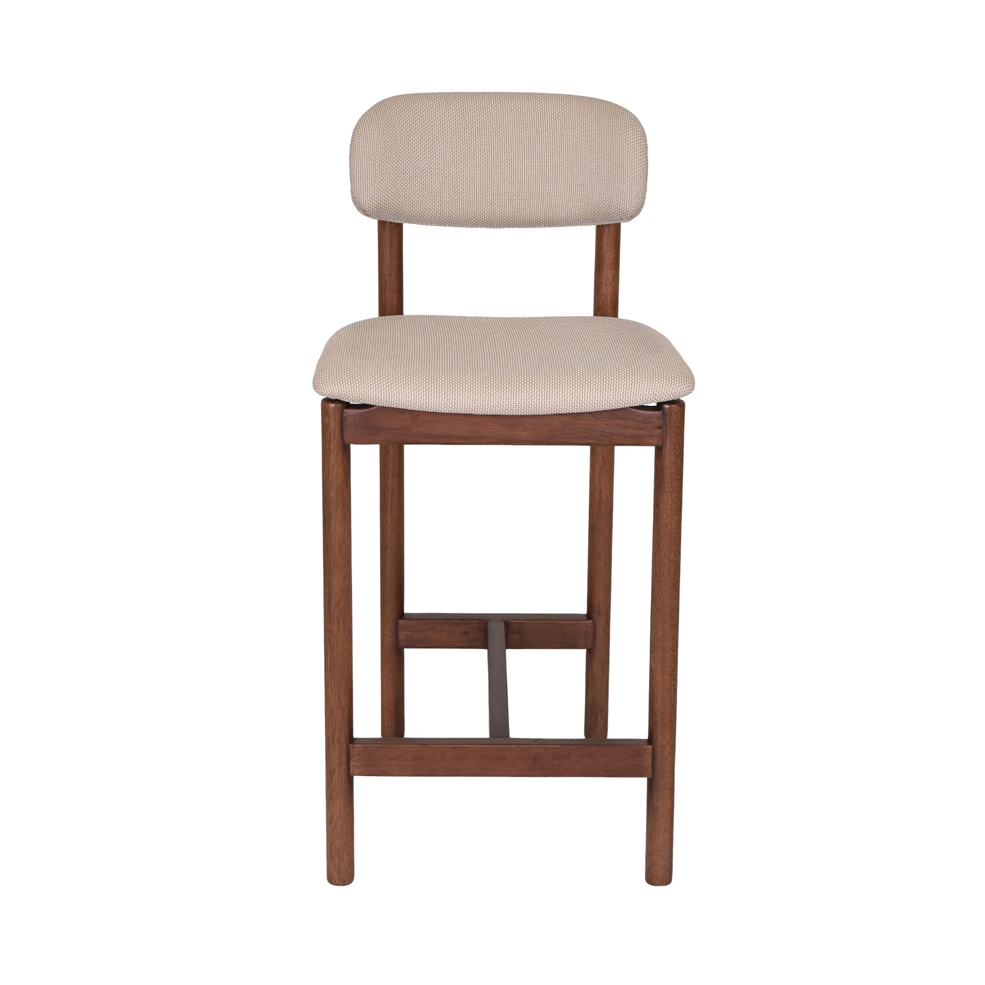 Tall restaurant counter chair with light upholstery and timber-colored frame