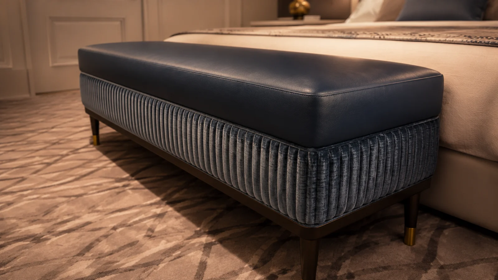 Bench with two visibly different upholstery surfaces