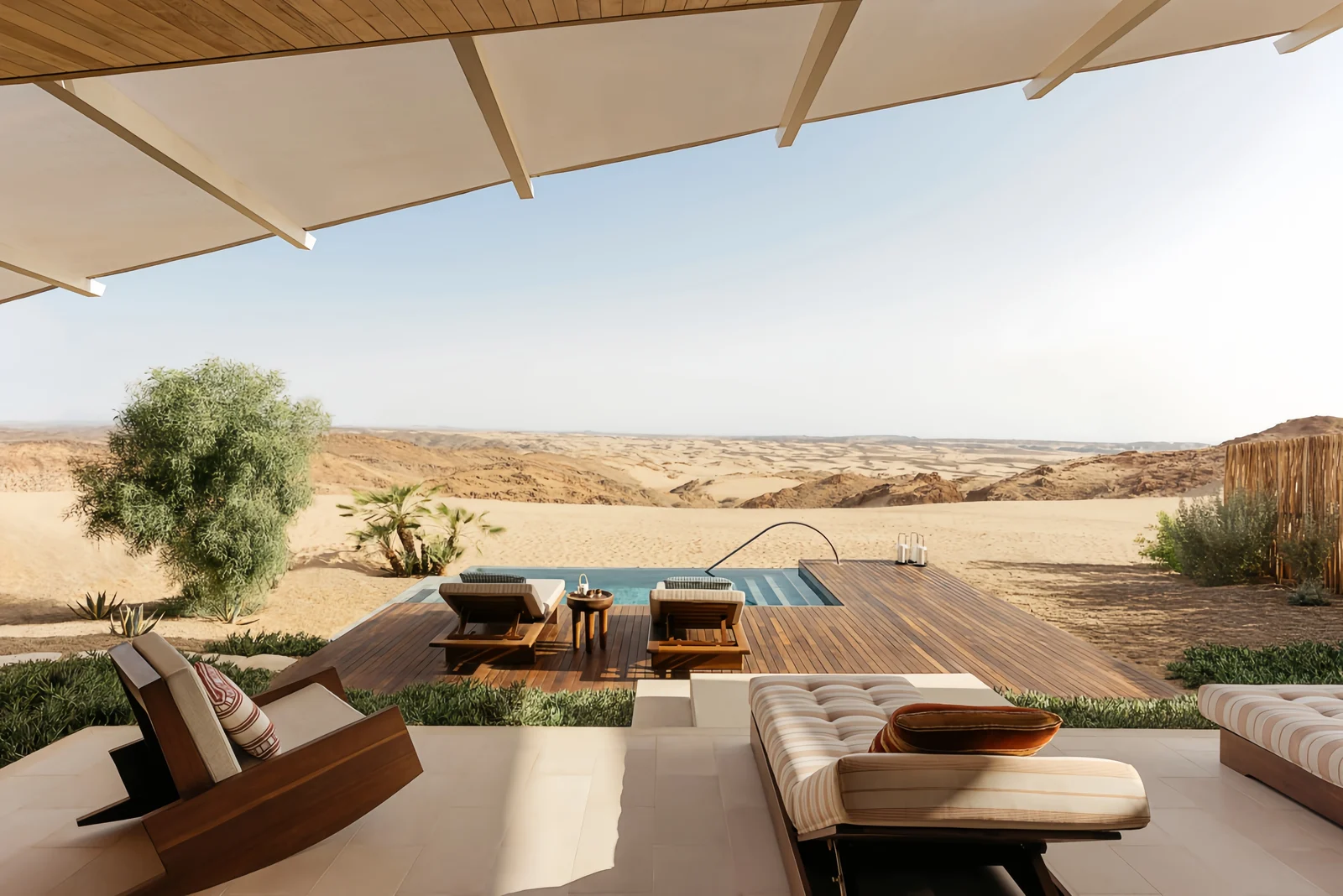 Hotel terrace crossing from shaded seating to an open poolside zone