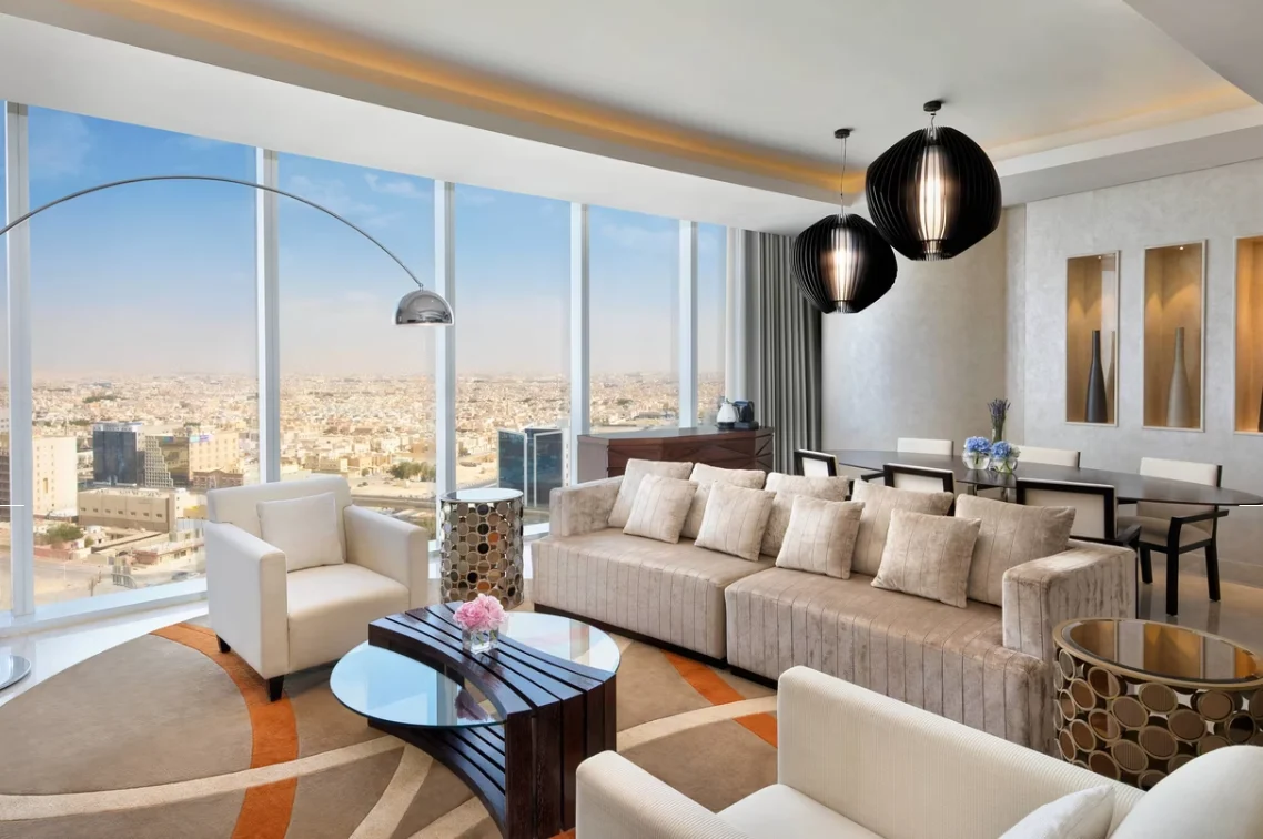 Hotel suite with several upholstered furniture types