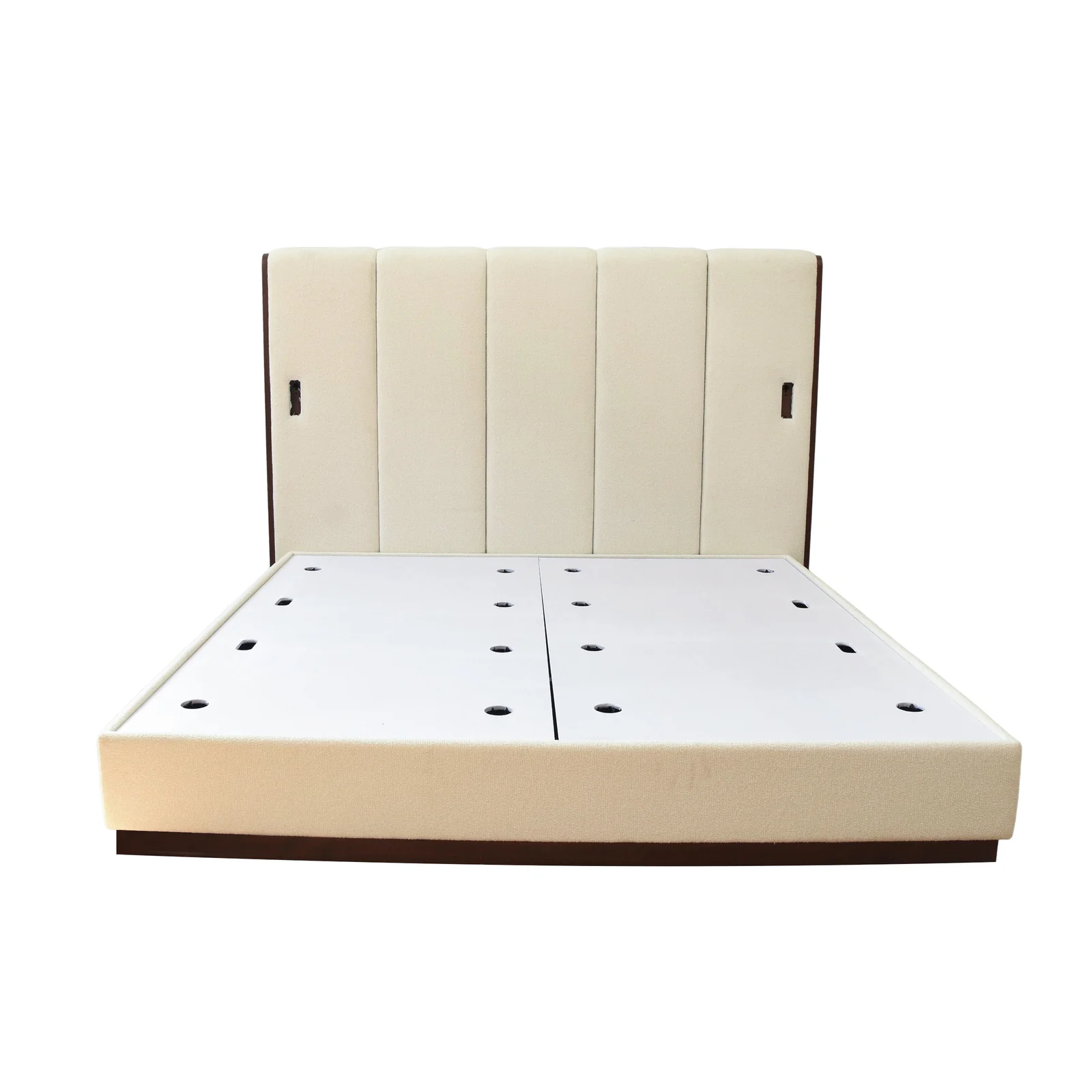 Cream hotel bed with a tall vertically channeled upholstered headboard