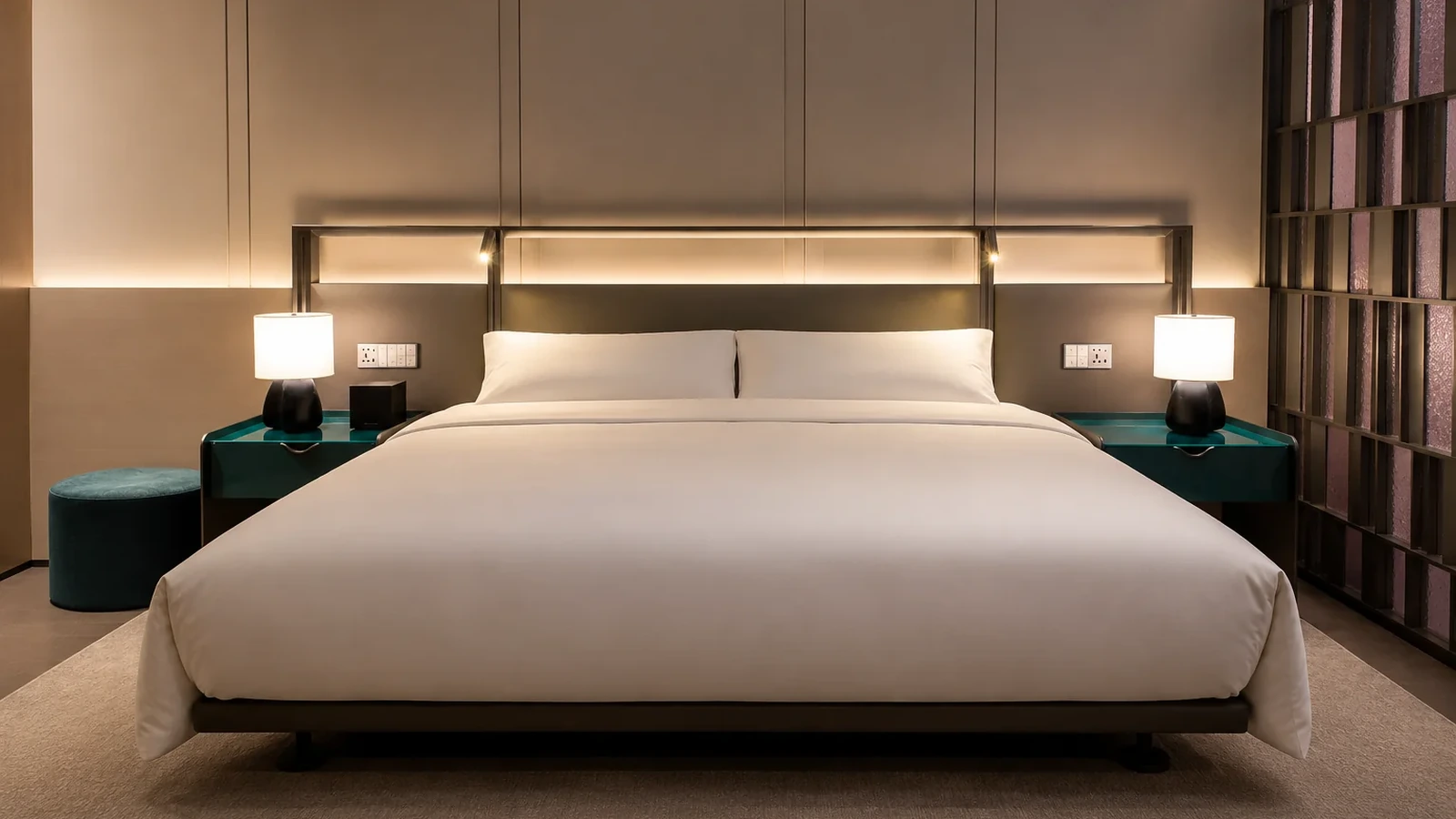 Bedside cabinets coordinated with a hotel bed and headboard