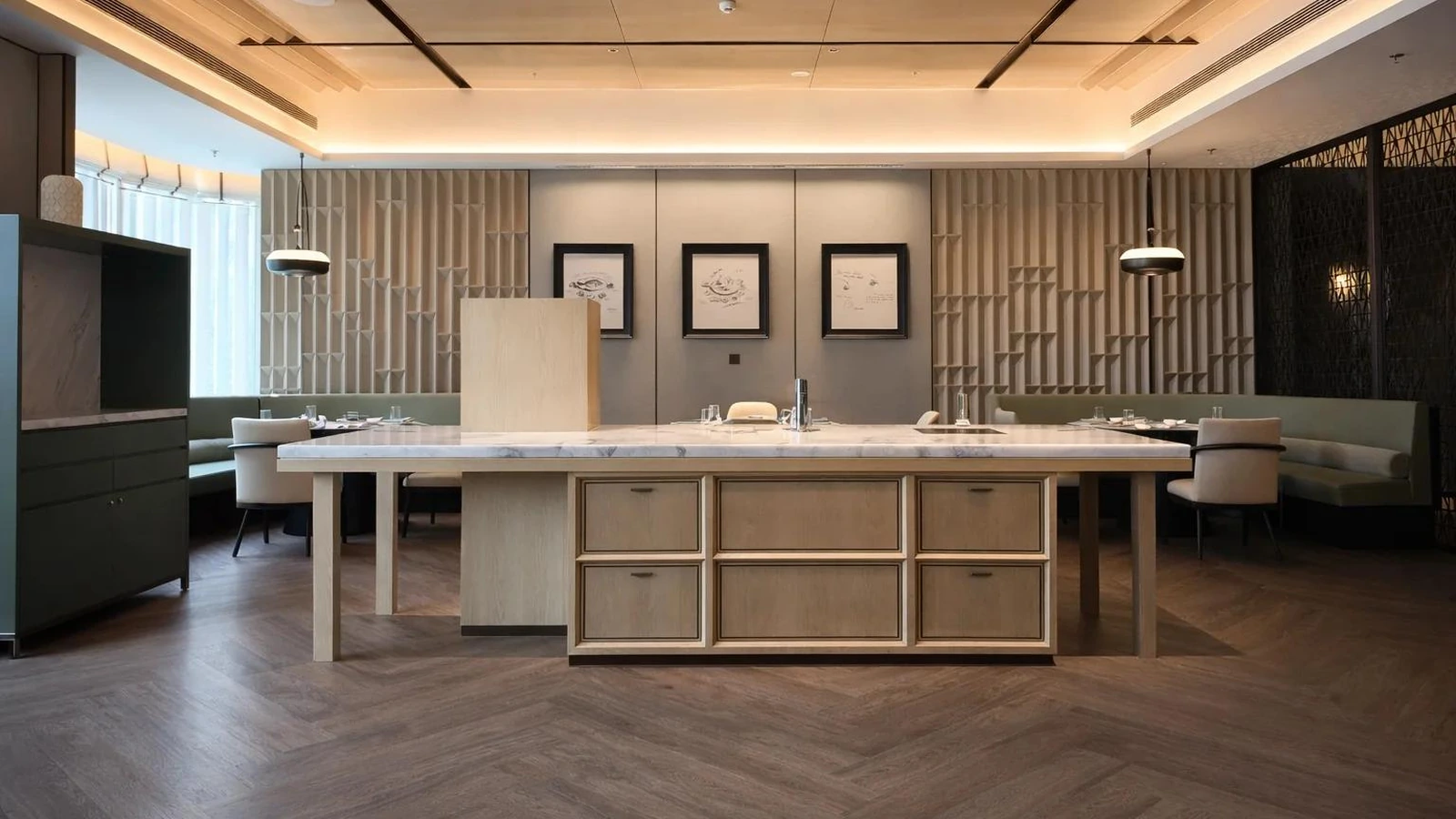 Hospitality service cabinet with framed drawer fronts and a contrasting countertop.
