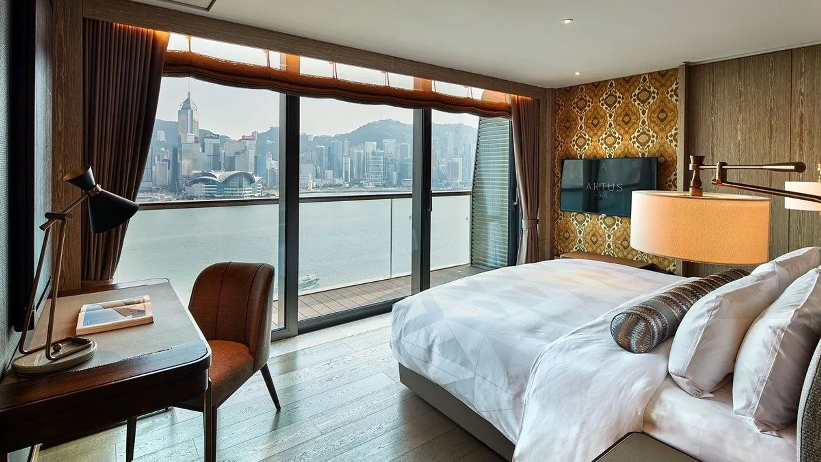 Studio bedroom with desk and view
